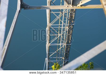 Metal Frame Of Outdoor Elevator In Switzerland, Bürgenstock With Lake In Background