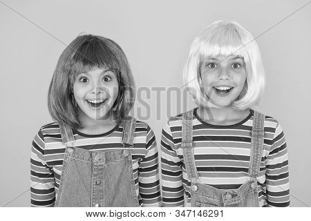 Cheerful Friends In Bright Colorful Wigs. Anime Cosplay Party Concept. Happy Childhood Concept. Anim