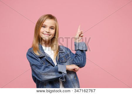 Smiling Little Kid Girl 12-13 Years Old In Denim Jacket Isolated On Pastel Pink Background Children 