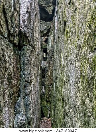 One of many rock crevasse formations within Szczeliniec sanstone ravine, Table Mountain National Park, Poland