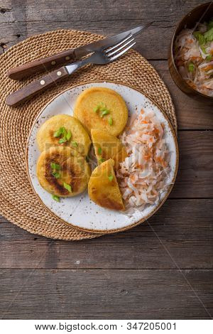Salvadoran Pupusa Served With Curtido  On Board. View From Above