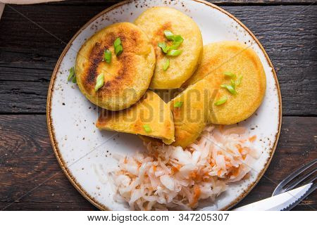 Salvadoran Pupusa Served With Curtido  On Board. View From Above