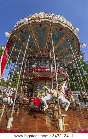 Vintage Carousel Or Merry-go-round. Outdoors Summer Day