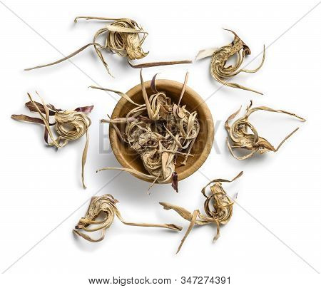 Dry Artichoke Flowers On A White Background. The View From The Top