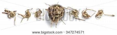 Dry Artichoke Flowers On A White Background. The View From The Top