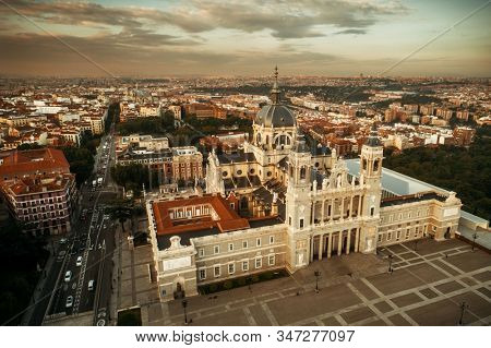 Aerial view of Catedral de la Almudena (Almudena Cathedral) at sunrise in Madrid, Spain.