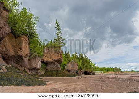 The Hopewell Rocks, commonlycalled the Flowerpots Rocks  are rock formations caused by tidal erosion in The Hopewell Rocks Ocean Tidal Exploration Site in New Brunswick, Canada.