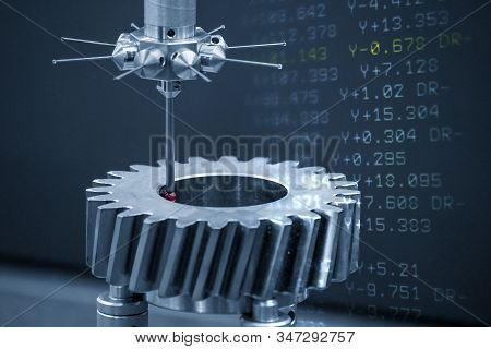 The Abstract Scene Of Cmm Machine And G-code Data, Measuring Dimension Of The Automotive Parts .the 