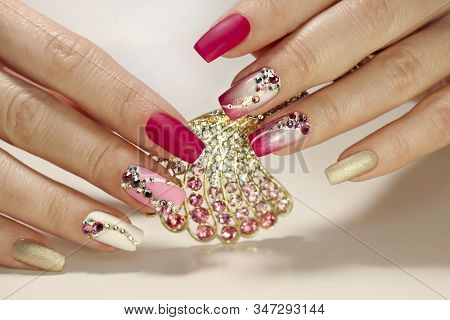 A Luxurious Manicure With A Pink Matte Finish For Nails And A Gradient From White With Gold To Pink 