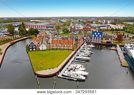 Aerial from traditional houses in the harbor from Huizen in the Netherlands
