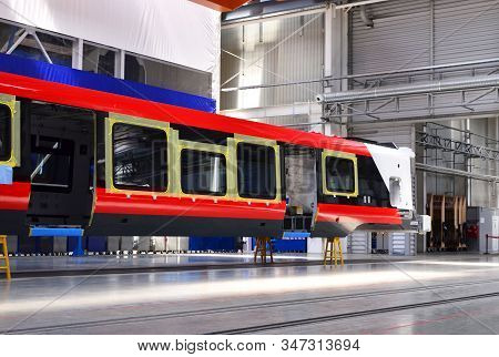Inside Of The Rail Car Assembly Plant. Industrial Workshop For The Production Of High Speed Trains. 