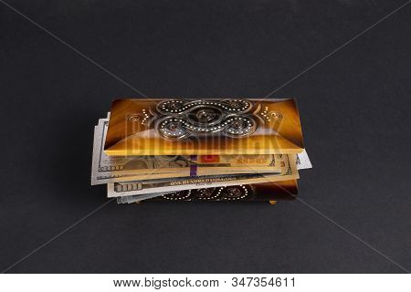 Silver Dollar Banknots In The Treasure Trove, Wooden Chest, Gift, Decoration On Dark Paper Backgroun