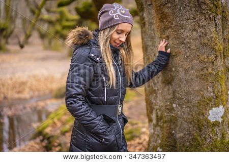 A Young Blonde Walking In The Otzarreta Forest In The Natural Park Of Gorbea, Bizkaia. Basque Countr
