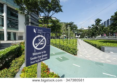 Singapore.  January 2020.  The No Smoking Sign In The Park Of  Li Ka Shing Library Building Of Singa