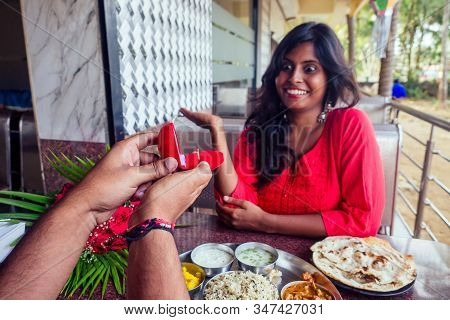 Amased And Surprised Indian Woman Feeling Happy To Get Proposal From Her Boyfriend In Restaurant. I 