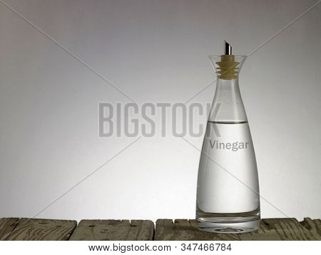 white vinegar on the gray background