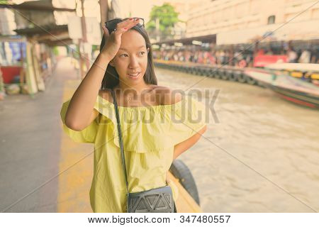 Young Beautiful Tourist Woman Exploring The City