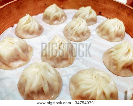 Serving Of Chinese Steamed Soup Filled Bun Xiaolongbao