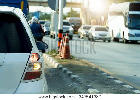 Transportation Of Cars On The Road. Open Light Brake Waiting To The Front Cars Make A U-turn. Headin