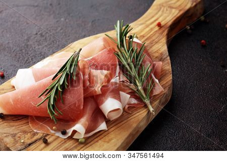 Dry Spanish Ham, Jamon Serrano, Bellota, Italian Prosciutto Crudo Or Parma Ham. Meat Cutting