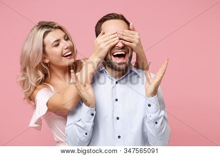 Excited Young Couple Two Guy Girl In Party Outfit Celebrating Posing Isolated On Pastel Pink Backgro