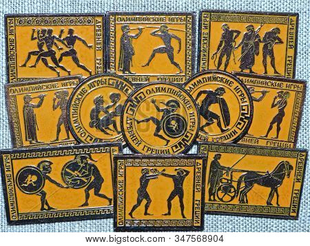 Ussr-circa 1980: Old Soviet Metal Badges With The Image Of The An Ancient Athletes And The Inscripti