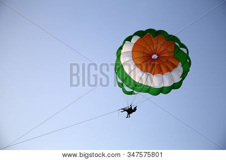 Paragliding On The Beautiful An Neat Colva Beach At Goa In The Open Blue Sky