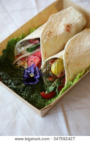 Shaverma Fruit Roll With Vegetables And Fruit And Sauce