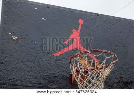 Kyiv, Ukraine -  April 21, 2016: Jumpman Logo By Nike Painted On The Black Backboard Of The Old Bask