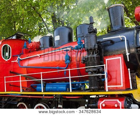 Old Soviet Steam Locomotive Blowing Off The Steam Out Of The Whistle