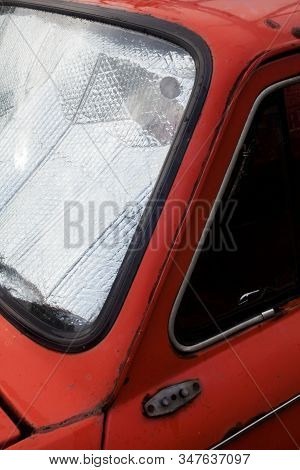 Old Car. Foil Sunshades On The Windshield (windscreen). Car Windshield Sun Shades. Sun Protection. C