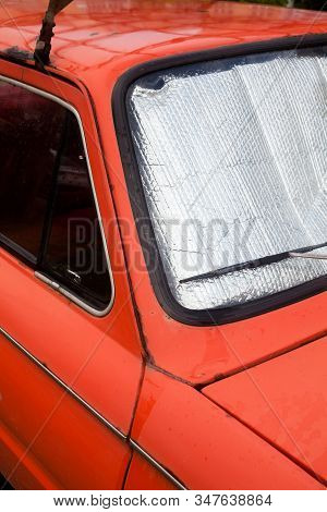 Old Car. Foil Sunshades On The Windshield (windscreen). Car Windshield Sun Shades. Sun Protection. C