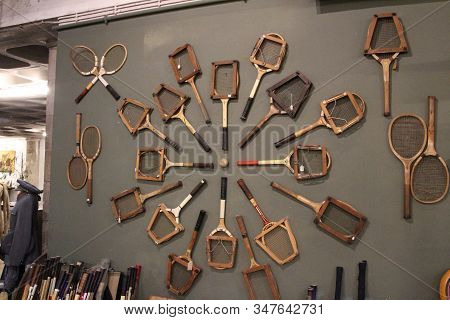 Porto, Portugal- January 3, 2020: Vintage Tennis Raquets For Sale In An Old Warehouse Called Armazem