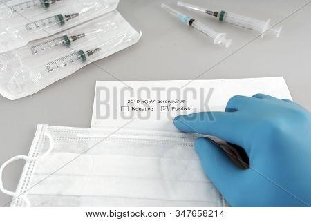 Doctor Points To Positive Test For New Rapidly Spreading Coronavirus 2019-ncov