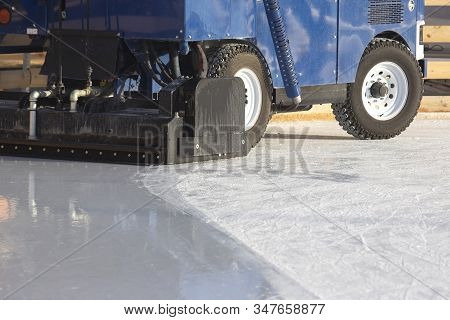 Special Machine For Cleaning Ice On An Ice Rink. Transport Industry. Street Ice Rink Service