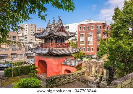 Nagasaki, Japan at Sofuku-ji Temple with the downtown cityscape.