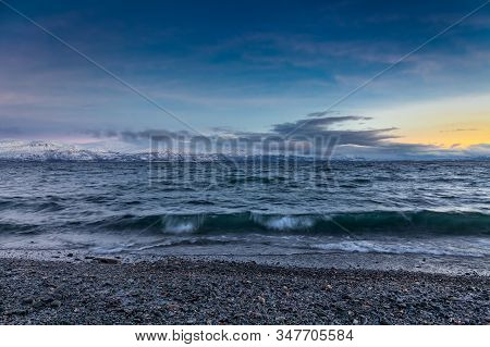 Beautiful View Over Beach And Fjord. Tornetrask, Sweden. Winter. Polar Night. Long Shutter Speed
