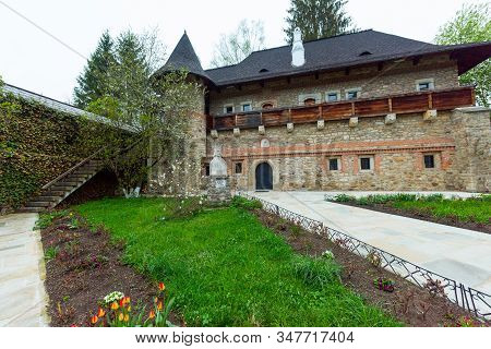 Orthodox Monastery And Monument To Petru Rares In Romania..