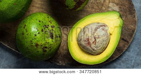 Fresh Avocado Is Cut In Half. They're High In The Healthy Kind Of Fats