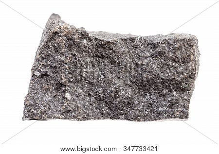 Closeup Of Sample Of Natural Mineral From Geological Collection - Rough Chromite Rock Isolated On Wh