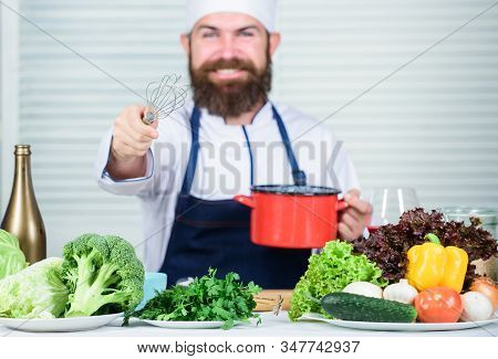 Use Hand Whisk. Professional Chef Hold Whisk And Pot. Whipping Like Pro. Man Bearded Guy In Apron Wh