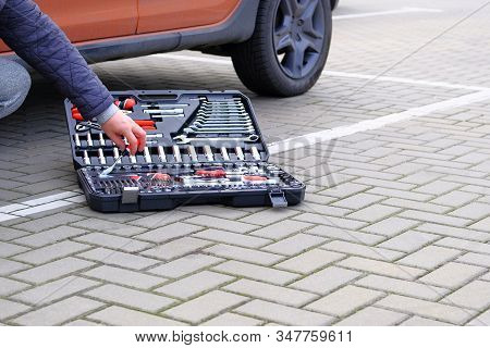 Closeup Picture Of Mechanical Workshop Tools. Сar Mechanic Using Different Repair Tools For Repairin