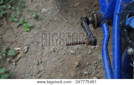Old Broken Pedals And Rusty Children's Bicycle.