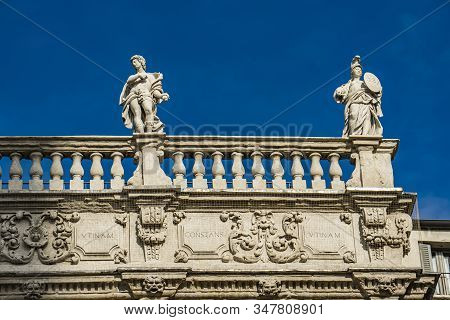 Detail Of Palazzo Maffei With Statues Of Divinities At Piazza Delle Erbe In Verona, Italy