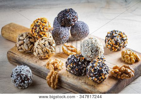 Energy Protein Balls With Healthy Ingredients And Coffee Latte. Home Made With Dried Apricots, Dates