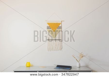 Home Decor, Design For A Cozy Workplace. Handmade Macrame Wallhanging In Modern Sparse Indoor Set