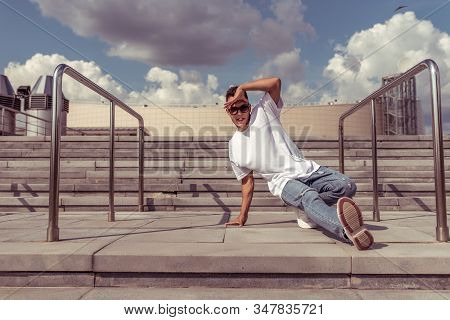 Dancer Is Young Guy, In Summer In City, Dancing Street Dances, Break Movement, Modern Youth Style. F