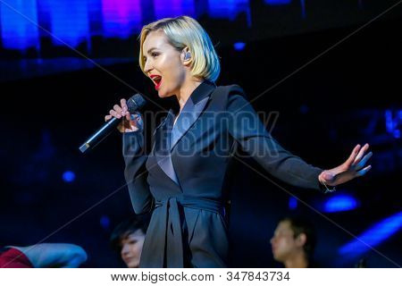 Moscow, Russia - April 23, 2018: Famous Russian singer Polina Gagarina sings in front of participants in the business forum