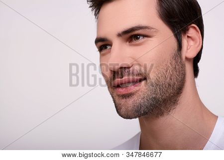 Close-up Man Portrait. Male Attractiveness Concept. Close Up Portrait Of A Sexy Smiling Young Man Wi