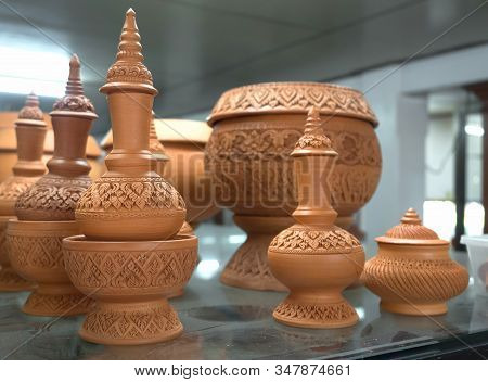 Thai Earthenware Handmade Carved Pots.
The Only Production In Thailand At Pak Kret District Nonthabu